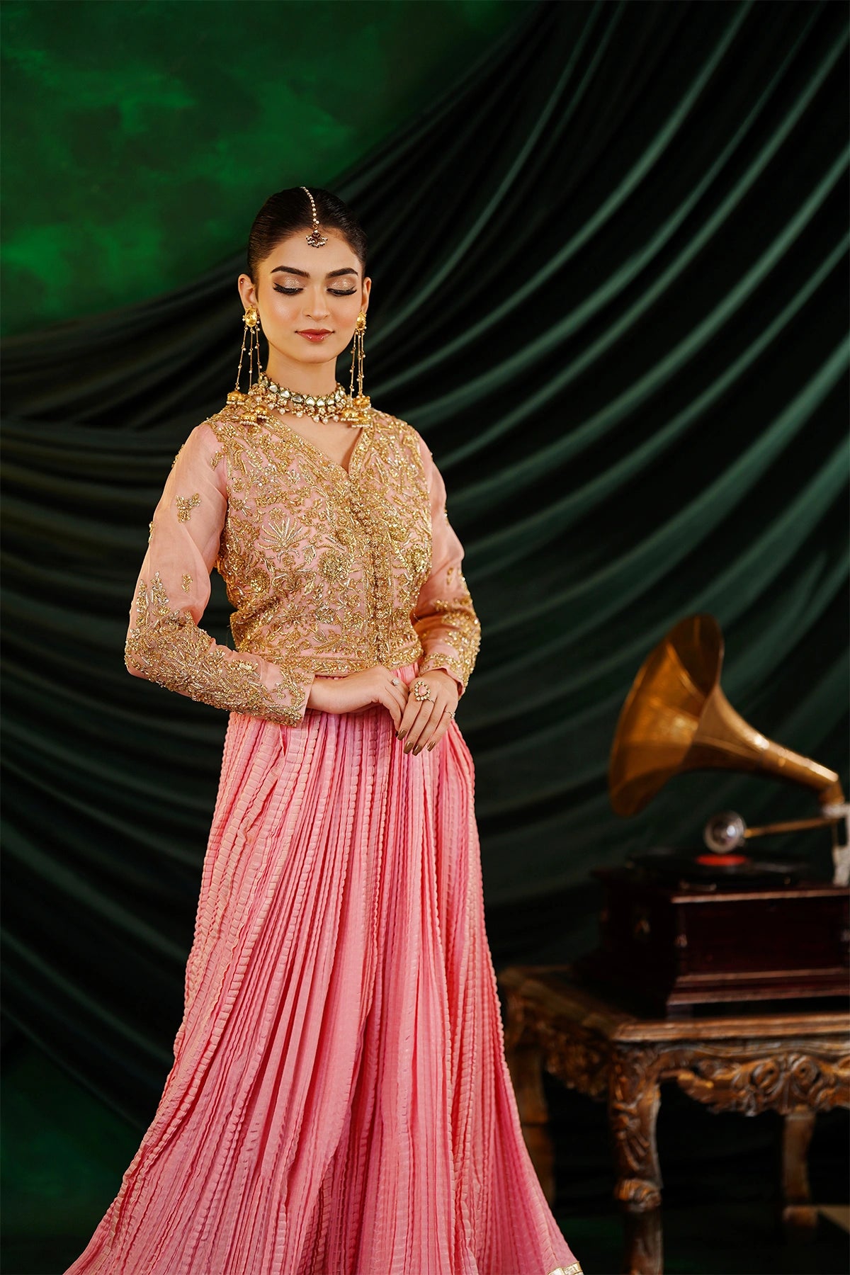 Abeer peach embellished organza blouse with Thai silk crushed palazzo and kamdani net dupatta by MariamRaj