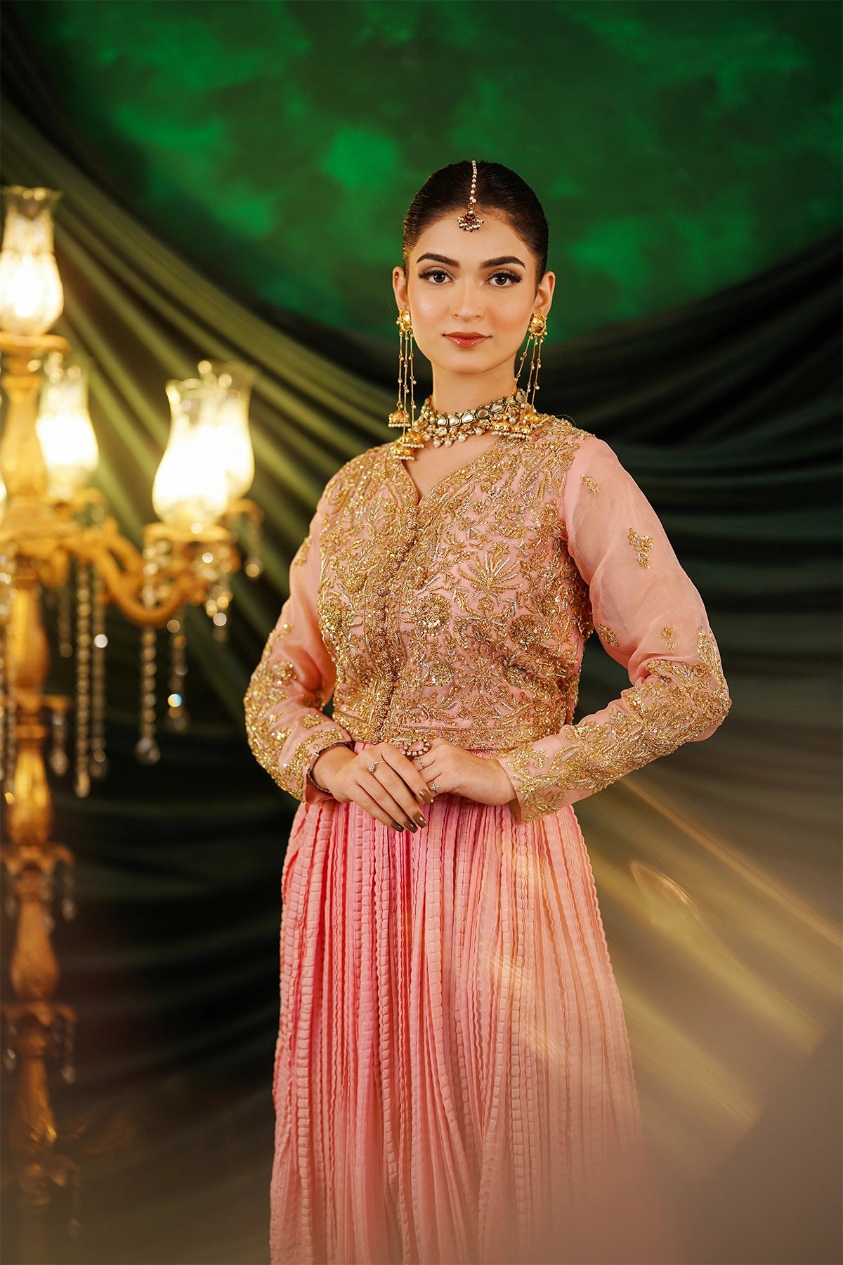 Abeer peach embellished organza blouse with Thai silk crushed palazzo and kamdani net dupatta by MariamRaj