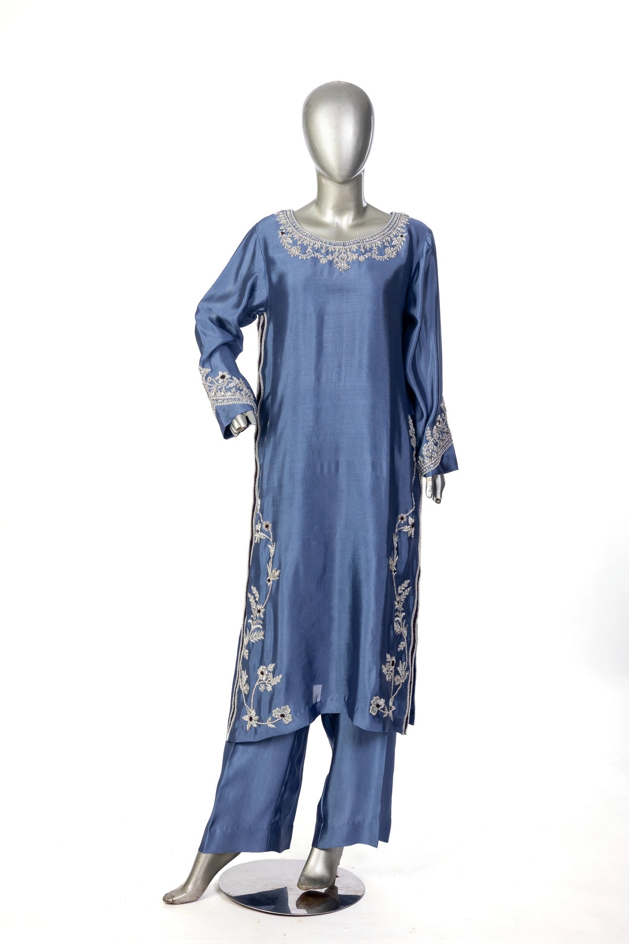 Abeera – Steel Blue Sheesha Silk embroidered suit with medium silk dupatta & straight trousers by MariamRaj. Perfect festive wear.