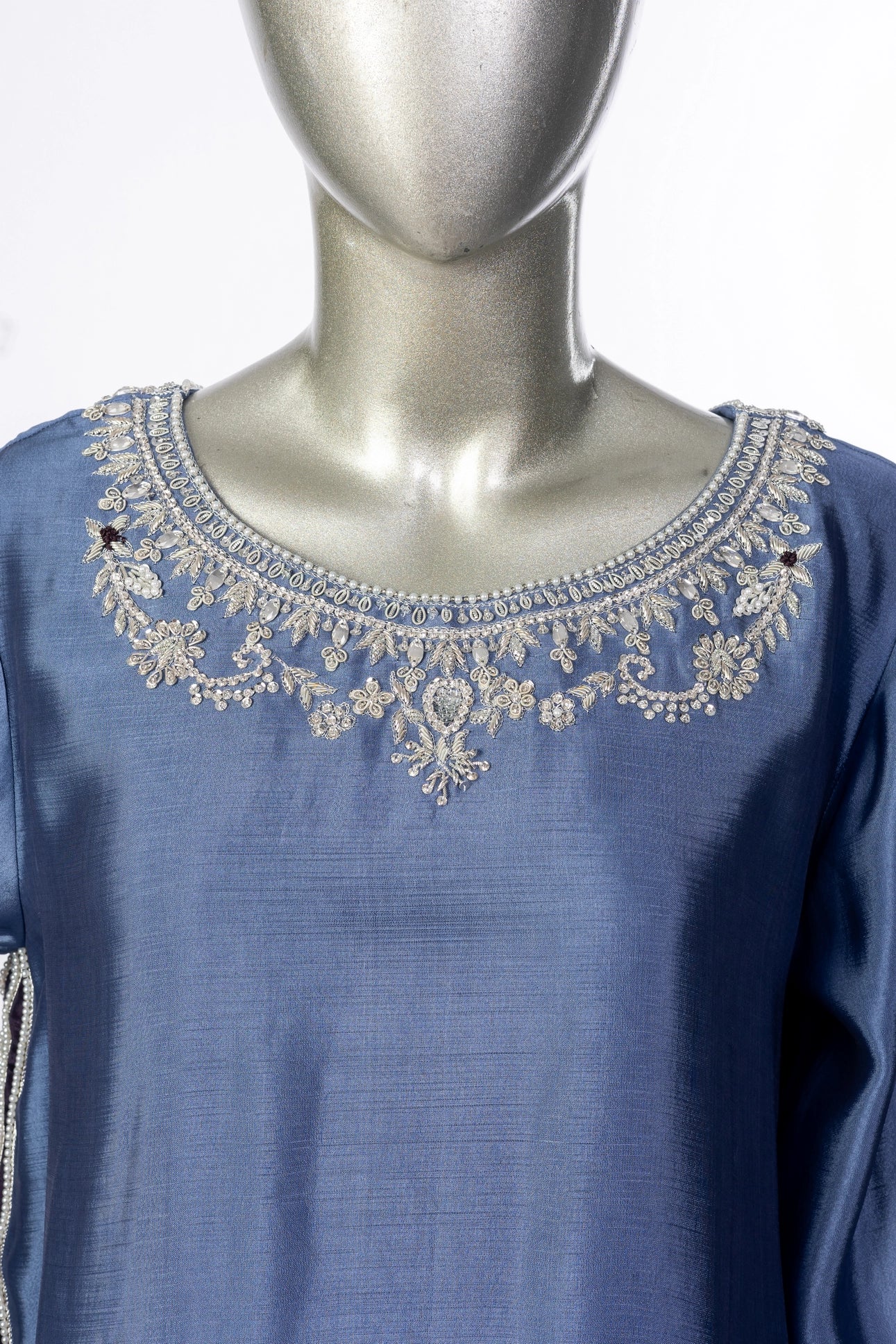Abeera – Steel Blue Sheesha Silk embroidered suit with medium silk dupatta & straight trousers by MariamRaj. Perfect festive wear.