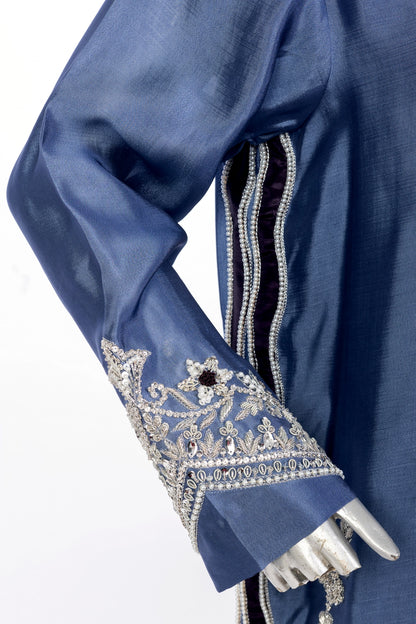 Abeera – Steel Blue Sheesha Silk embroidered suit with medium silk dupatta & straight trousers by MariamRaj. Perfect festive wear.