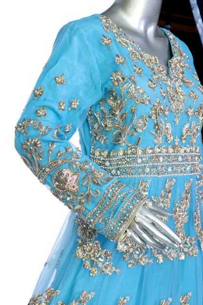 Sky-blue Pakistani Anarkali dress by MariamRaj with floral embroidery, sharara pants, and net dupatta – perfect for weddings and occasions in the USA.