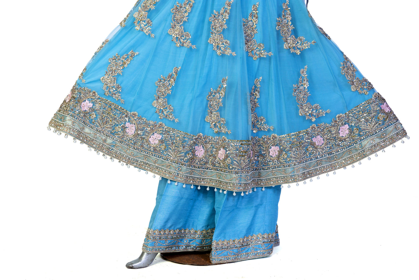 Sky-blue Pakistani Anarkali dress by MariamRaj with floral embroidery, sharara pants, and net dupatta – perfect for weddings and occasions in the USA.