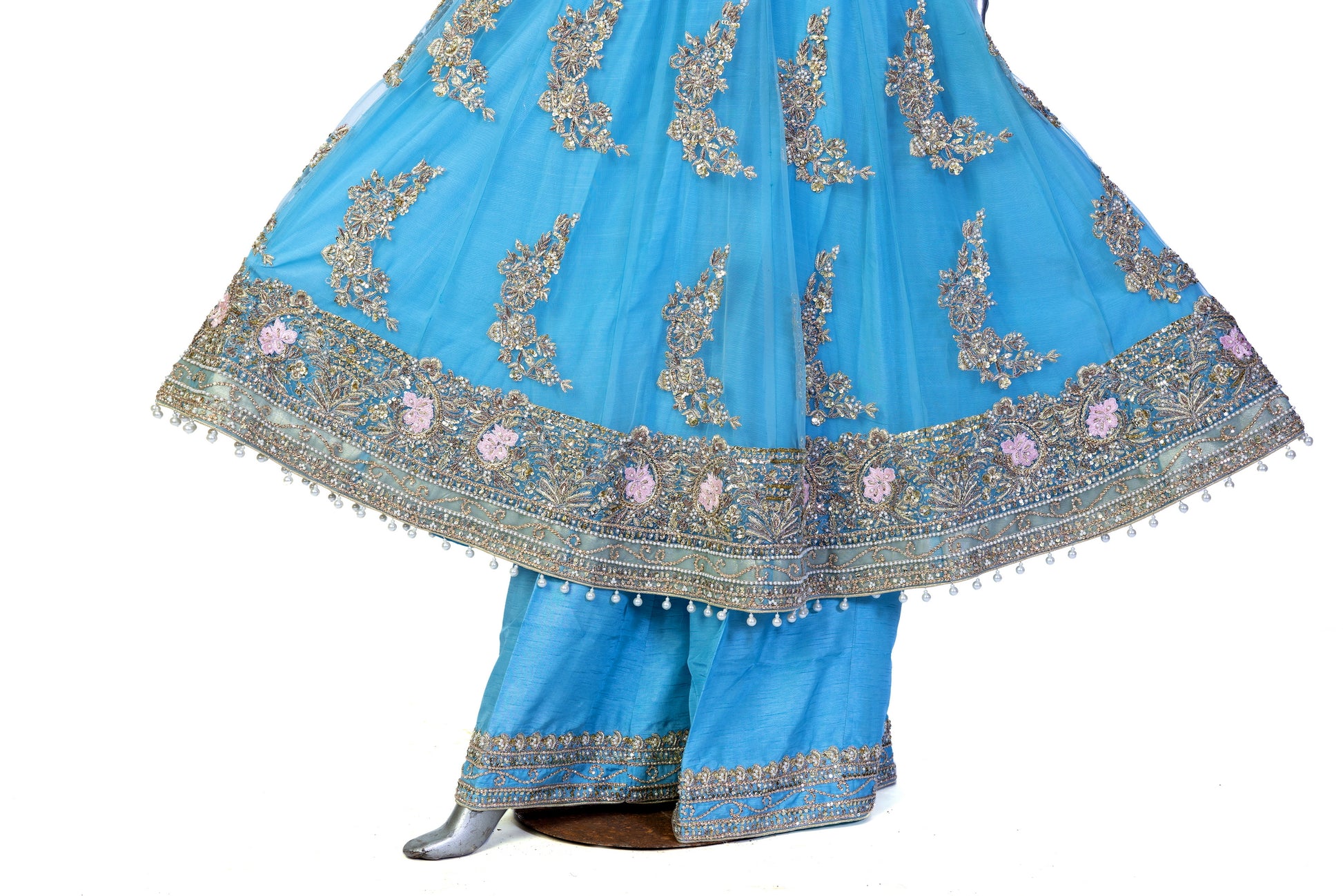 Sky-blue Pakistani Anarkali dress by MariamRaj with floral embroidery, sharara pants, and net dupatta – perfect for weddings and occasions in the USA.