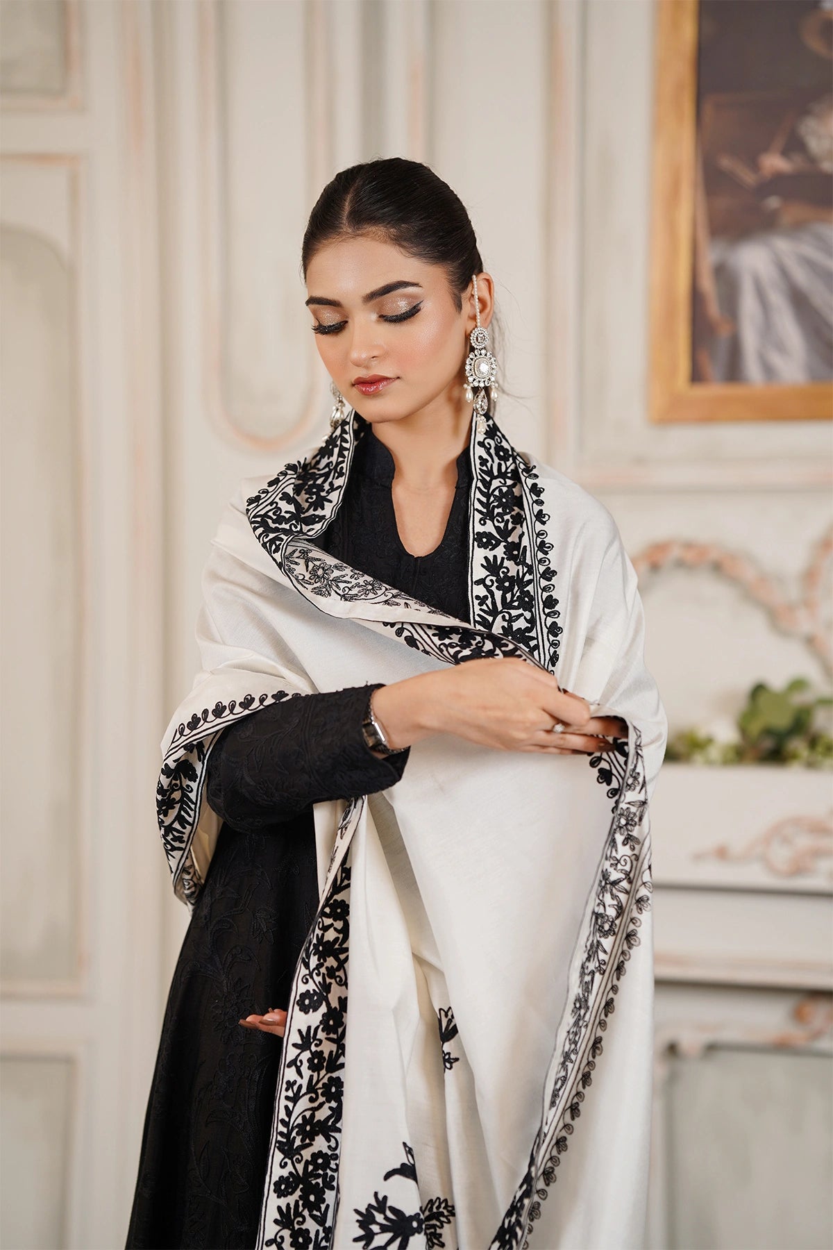 Elara black khaadi net embroidered frock with Korean silk palazzo pants and embroidered silk dupatta by MariamRaj