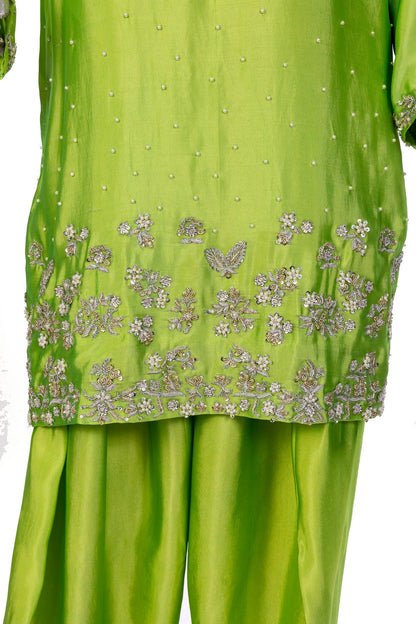 Fakhira – Lime Green Sheesha Silk embroidered suit with resham & gota work, farshi shalwar & organza dupatta by MariamRaj.