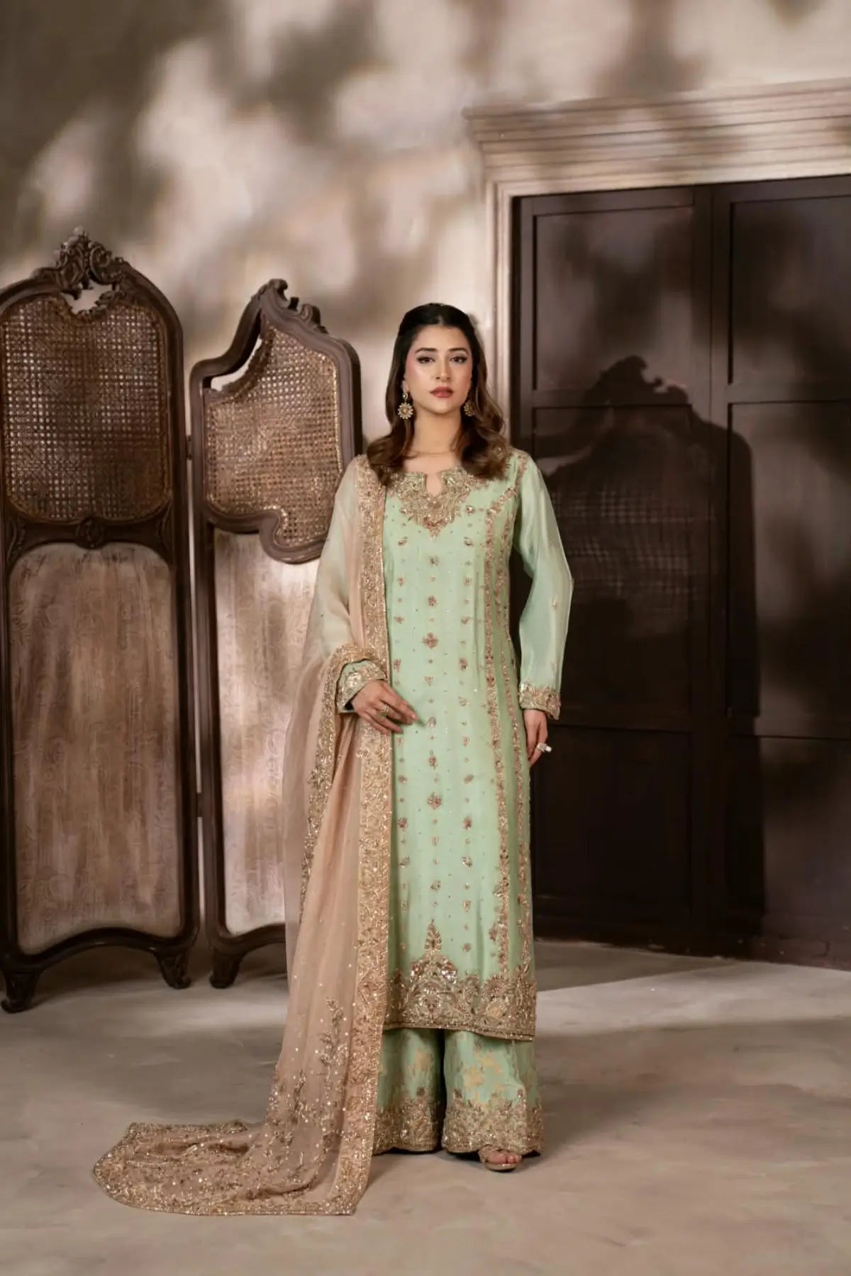 Gulbahar mint green handworked Sheesha silk formal suit with peach organza dupatta by MariamRaj