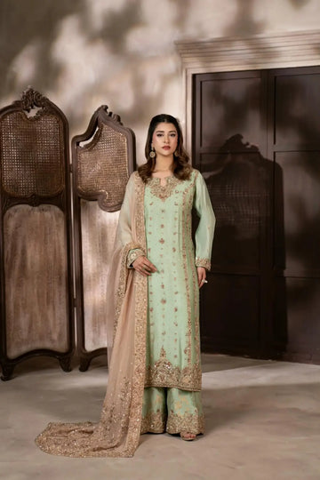 Gulbahar mint green handworked Sheesha silk formal suit with peach organza dupatta by MariamRaj