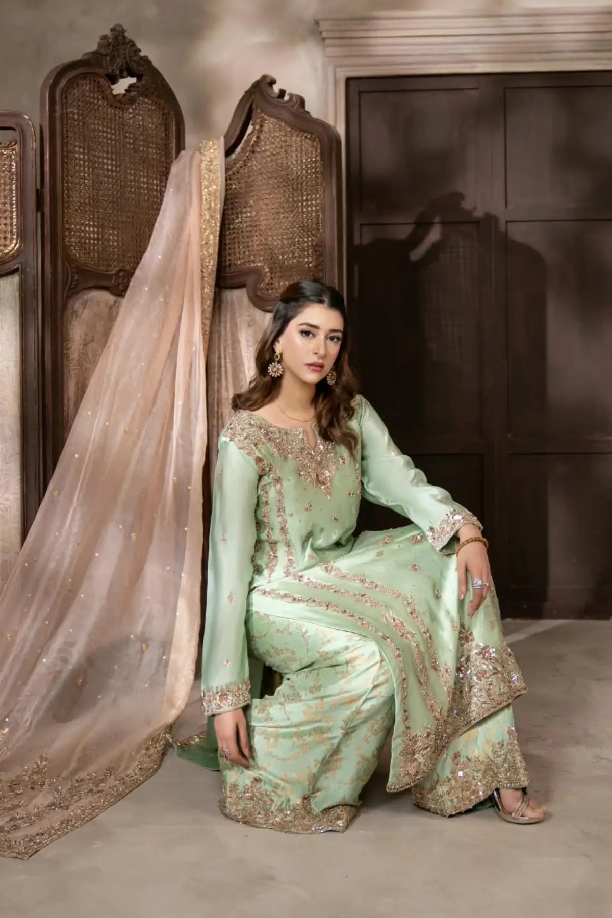 Gulbahar mint green handworked Sheesha silk formal suit with peach organza dupatta by MariamRaj