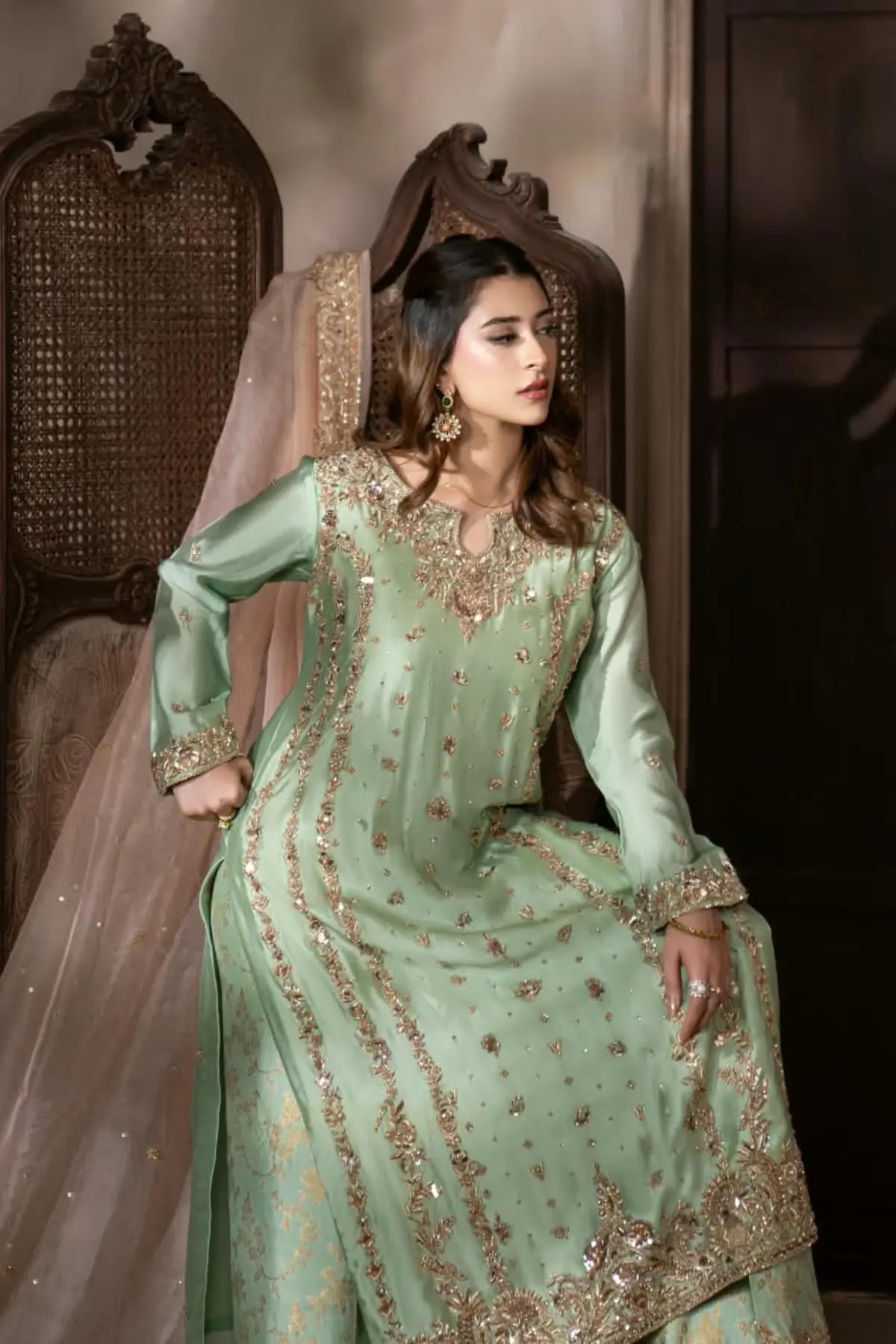 Gulbahar mint green handworked Sheesha silk formal suit with peach organza dupatta by MariamRaj