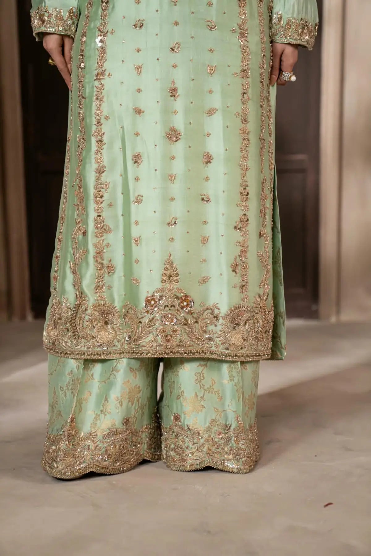 Gulbahar mint green handworked Sheesha silk formal suit with peach organza dupatta by MariamRaj