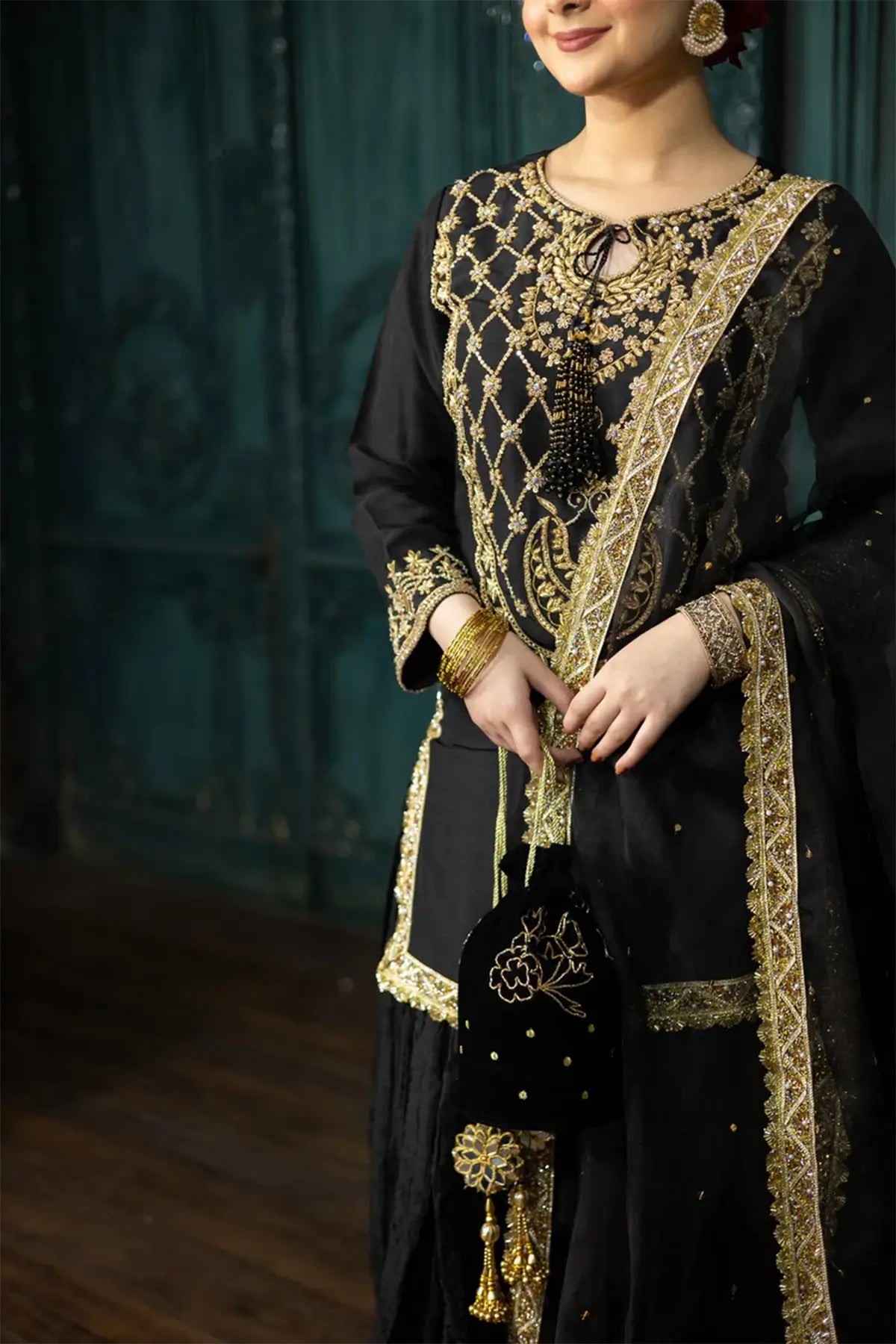 Kajal- Formal Black and Gold Sharara Suit