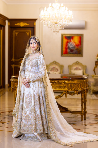 White Pakistani bridal outfit with pure organza shirt and dupatta, paired with silk lehenga – elegant nikkah dress for brides in USA, UK, and Canada.
