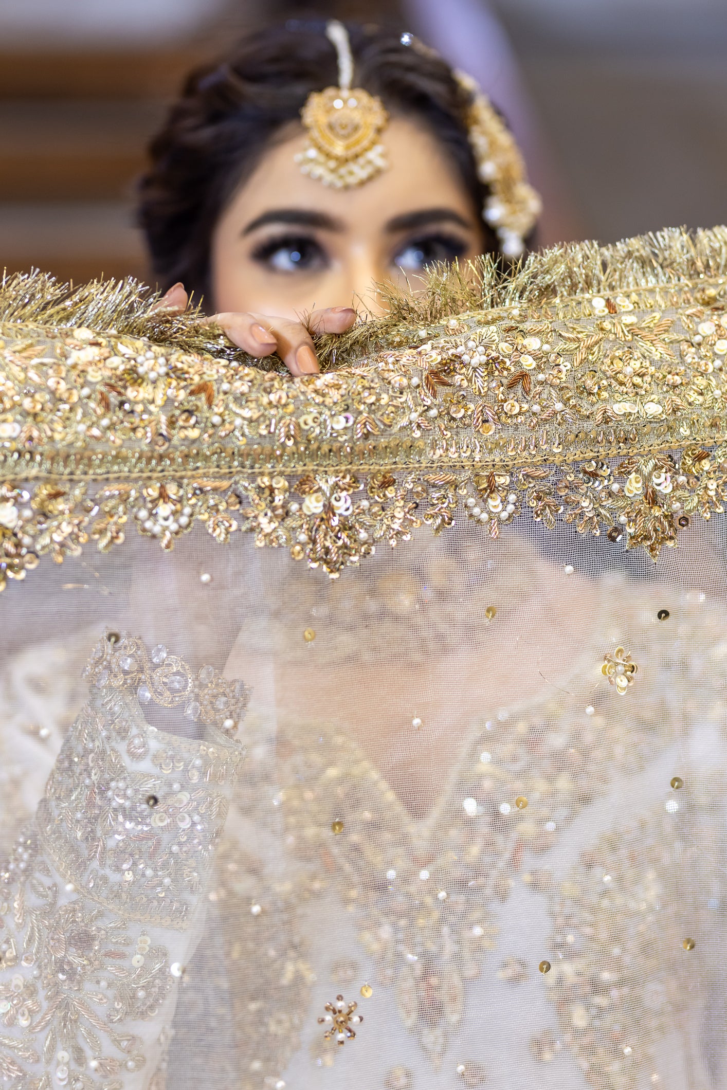 White Pakistani bridal outfit with pure organza shirt and dupatta, paired with silk lehenga – elegant nikkah dress for brides in USA, UK, and Canada.