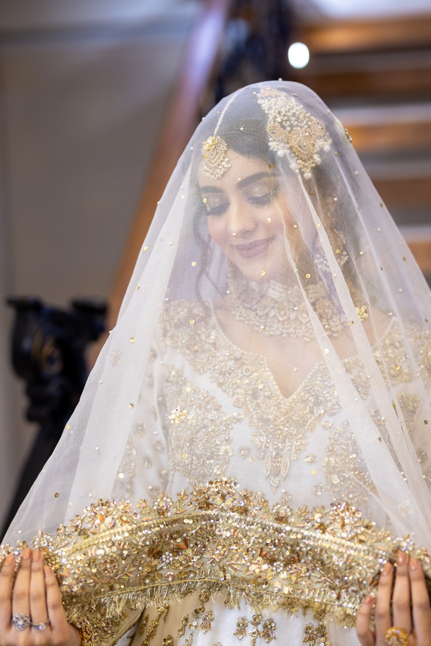White Pakistani bridal outfit with pure organza shirt and dupatta, paired with silk lehenga – elegant nikkah dress for brides in USA, UK, and Canada.