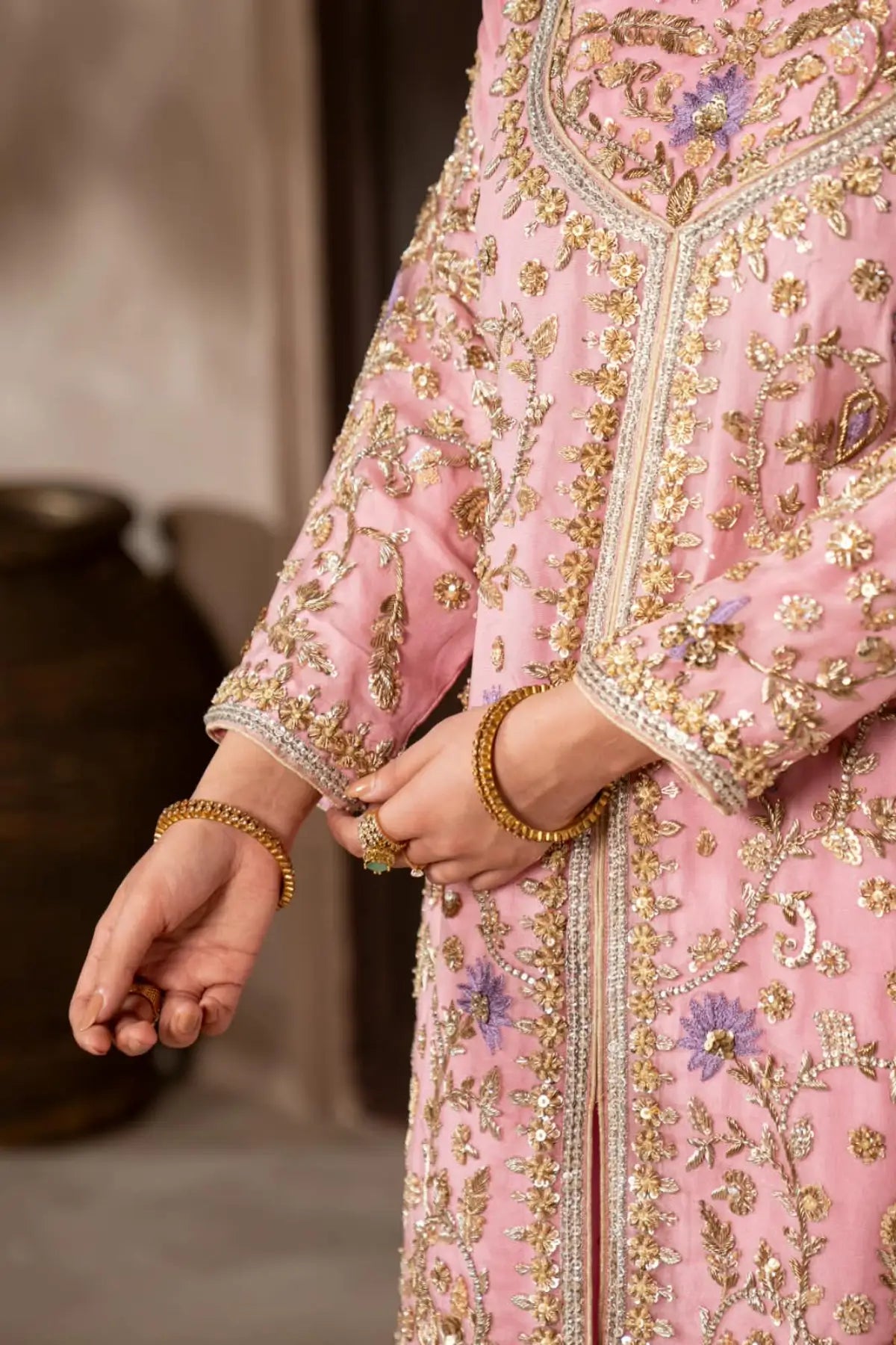 Mahgul powder pink hand embellished organza wedding suit with Kamdani net sharara and lavender net dupatta by MariamRaj