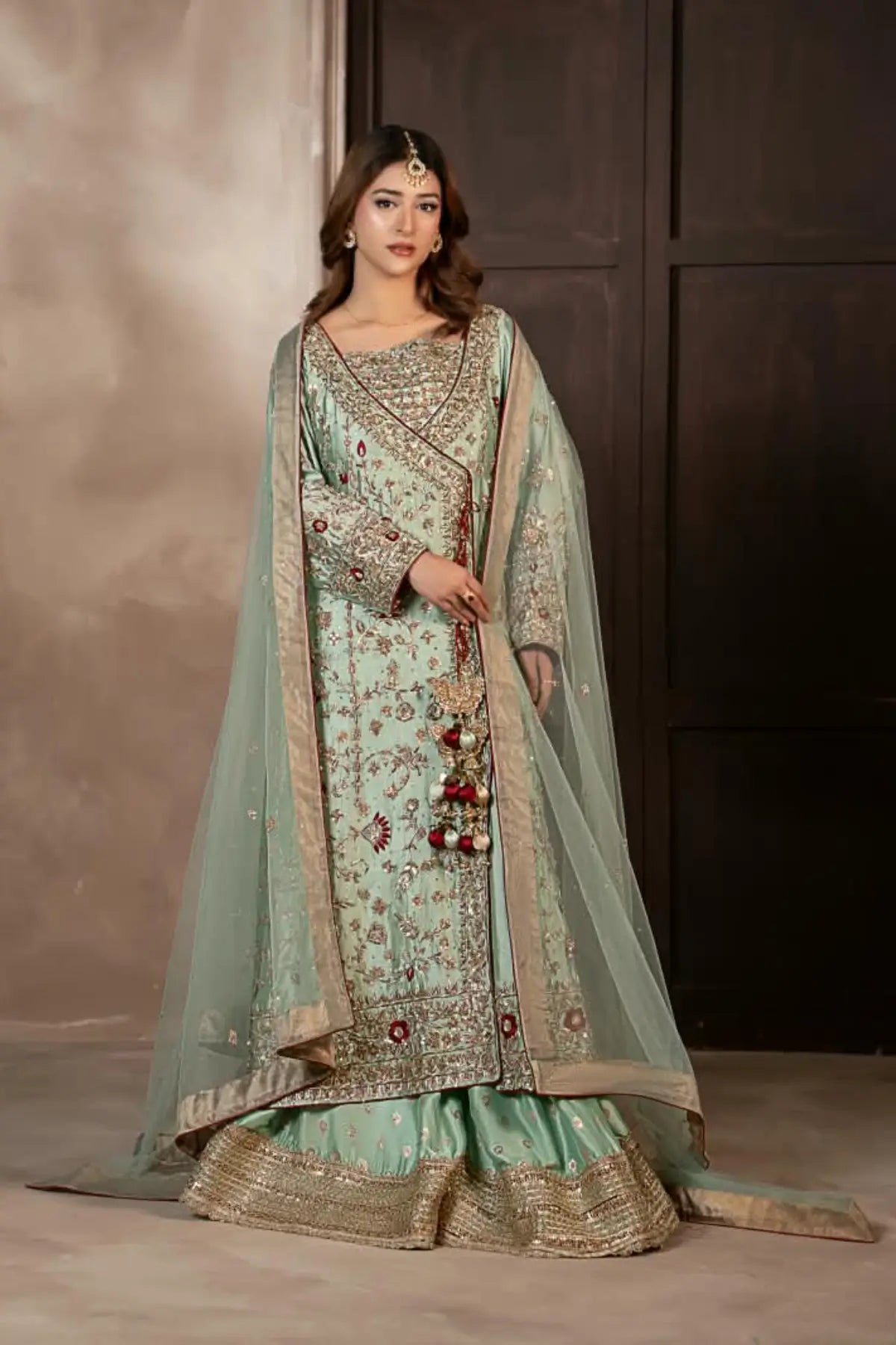 Narmeen mint green handworked Tassel silk Angrakha wedding dress with Jamawar palazzo and organza dupatta by MariamRaj
