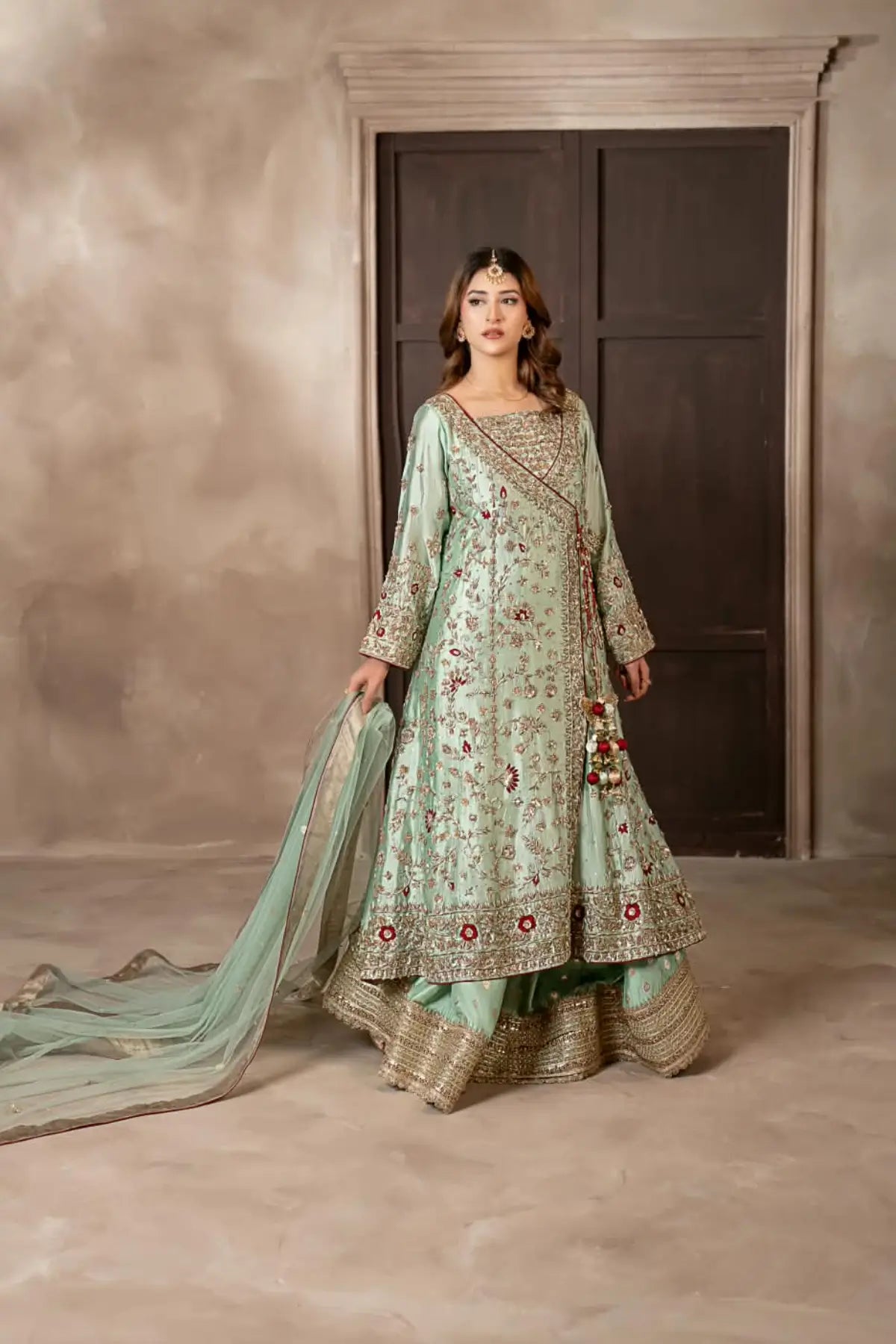 Narmeen mint green handworked Tassel silk Angrakha wedding dress with Jamawar palazzo and organza dupatta by MariamRaj