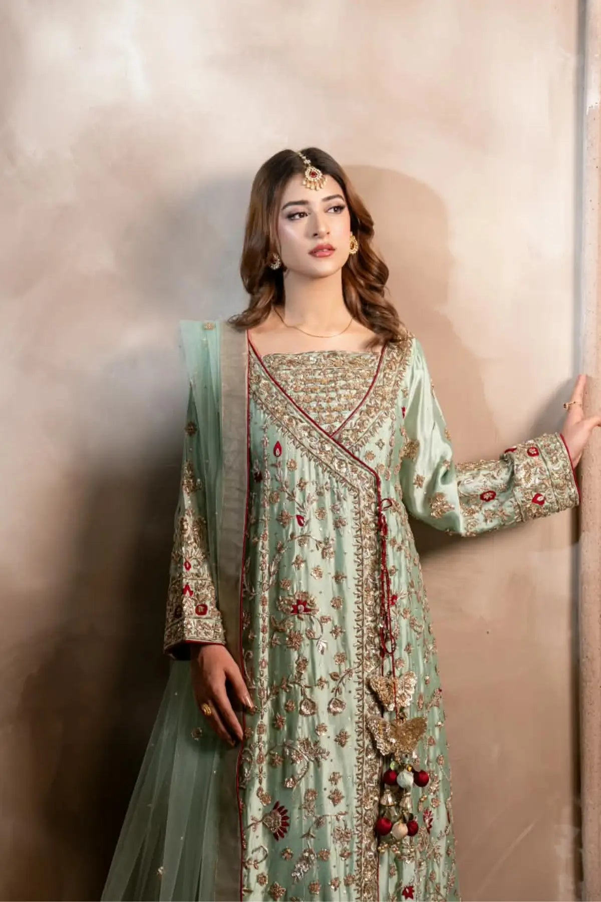 Narmeen mint green handworked Tassel silk Angrakha wedding dress with Jamawar palazzo and organza dupatta by MariamRaj