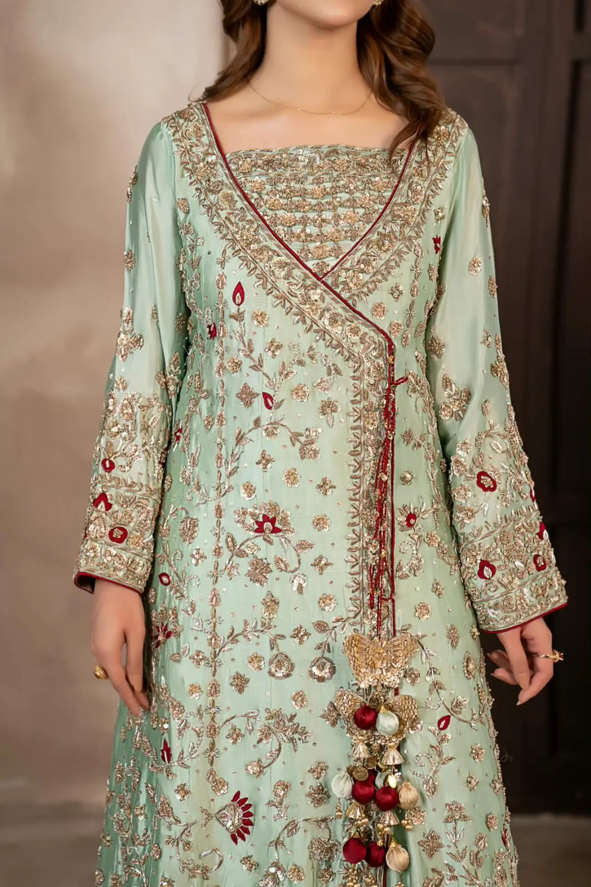 Narmeen mint green handworked Tassel silk Angrakha wedding dress with Jamawar palazzo and organza dupatta by MariamRaj