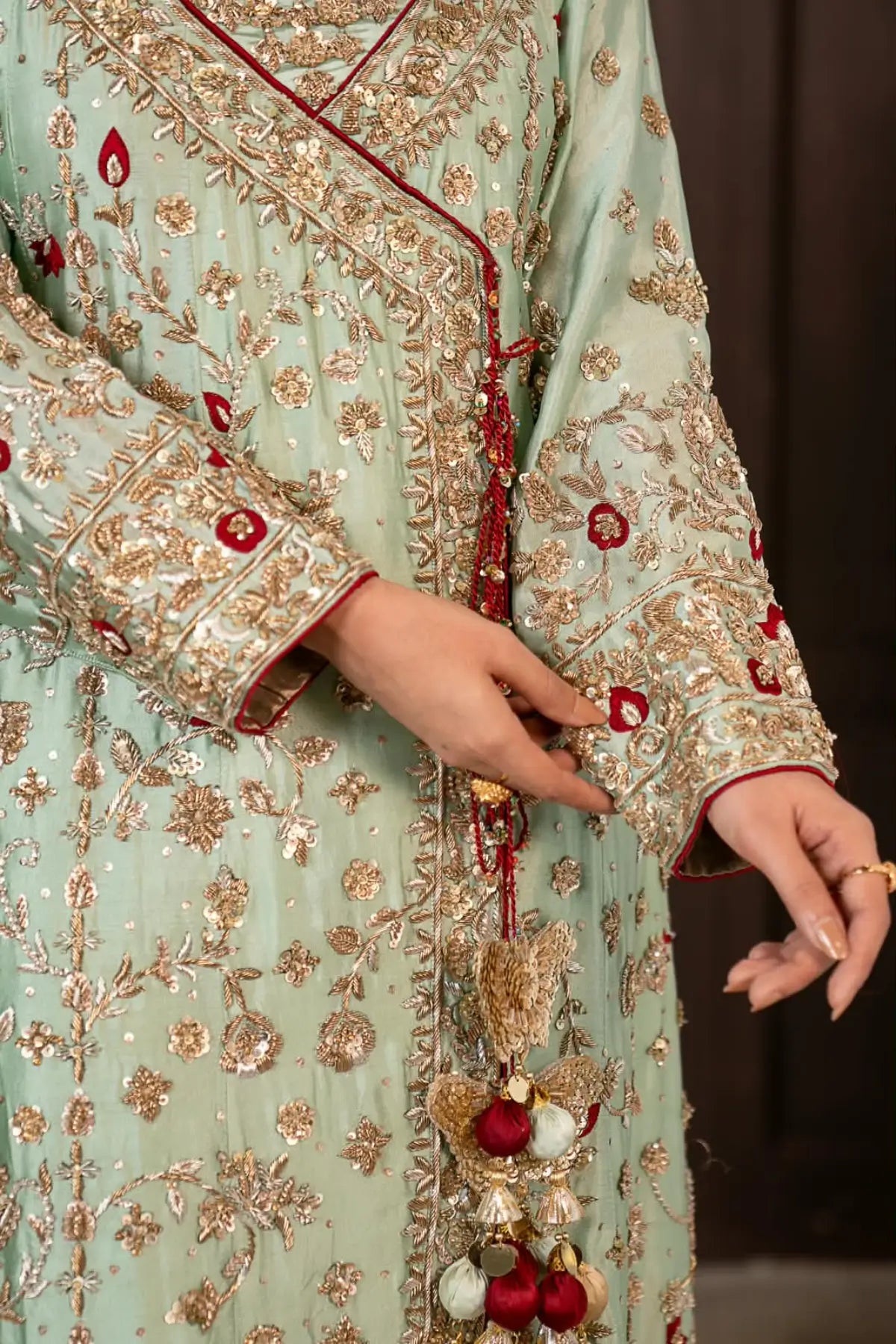 Narmeen mint green handworked Tassel silk Angrakha wedding dress with Jamawar palazzo and organza dupatta by MariamRaj