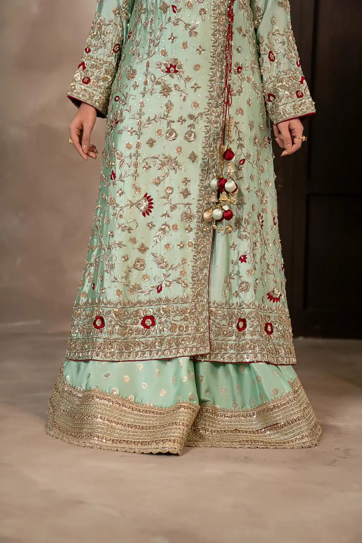 Narmeen mint green handworked Tassel silk Angrakha wedding dress with Jamawar palazzo and organza dupatta by MariamRaj