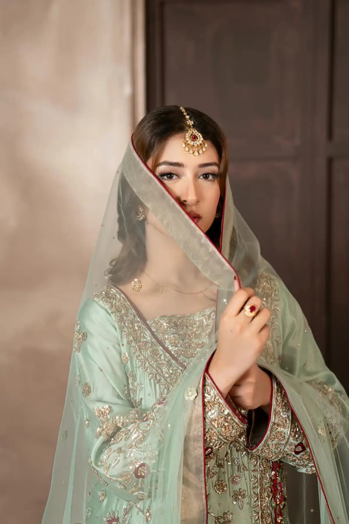 Narmeen mint green handworked Tassel silk Angrakha wedding dress with Jamawar palazzo and organza dupatta by MariamRaj