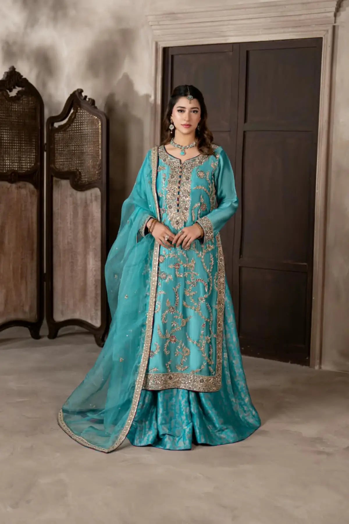 Neelam teal blue hand embellished Sheesha silk wedding dress with Jamawar palazzo and organza dupatta by MariamRaj