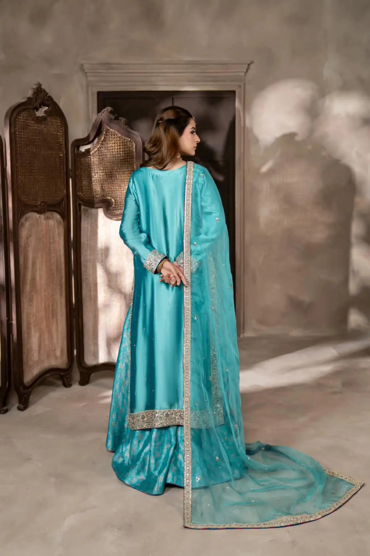 Neelam teal blue hand embellished Sheesha silk wedding dress with Jamawar palazzo and organza dupatta by MariamRaj