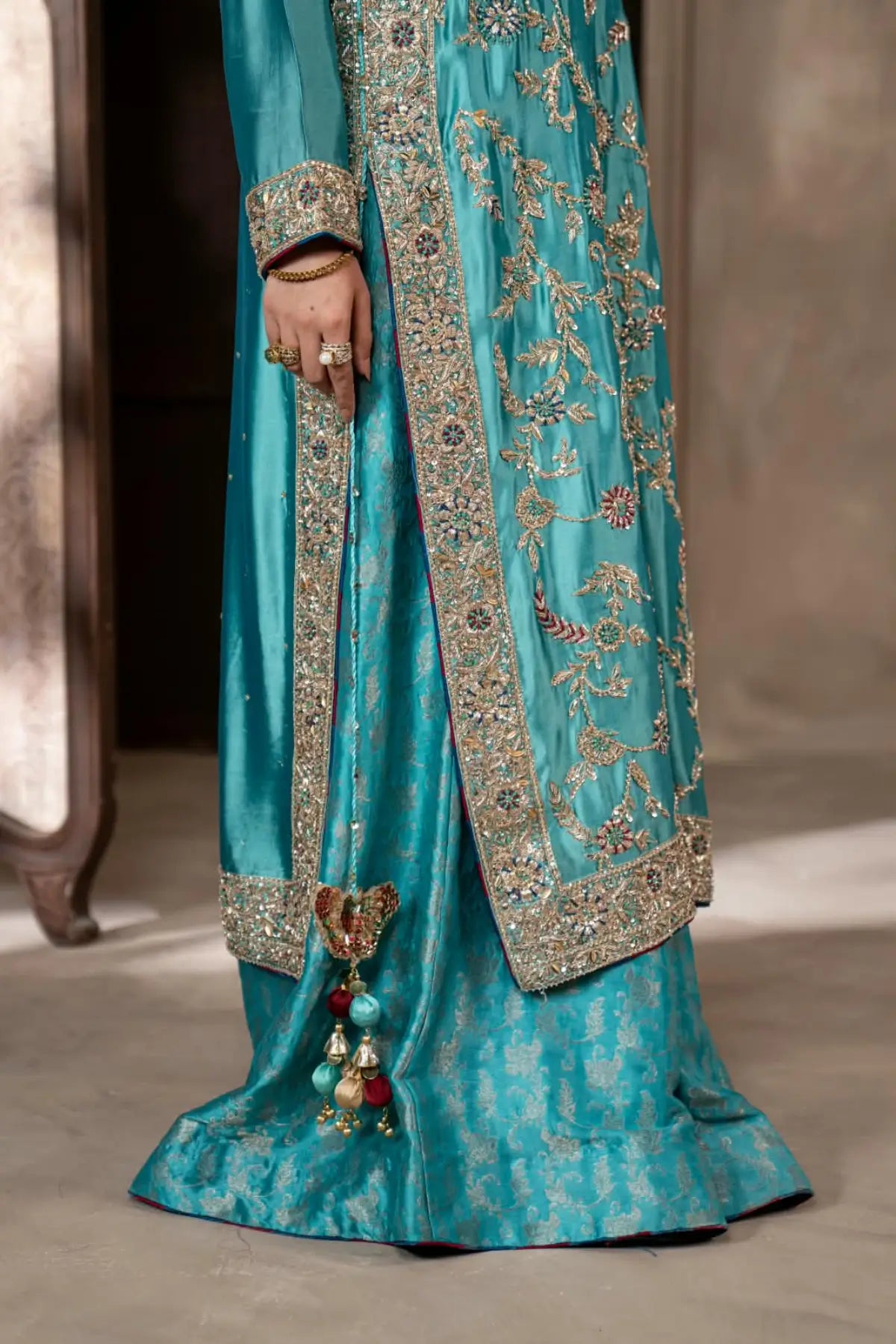 Neelam teal blue hand embellished Sheesha silk wedding dress with Jamawar palazzo and organza dupatta by MariamRaj