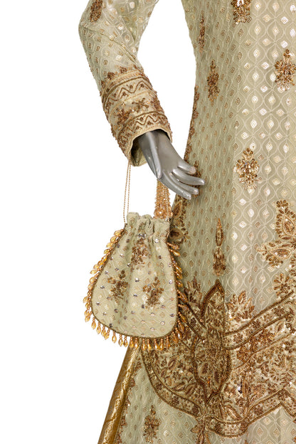 Olive green and gold Pakistani bridal Anarkali dress by MariamRaj, featuring gold and copper handwork, gold lehenga, and net dupatta – custom stitched for UK weddings.
