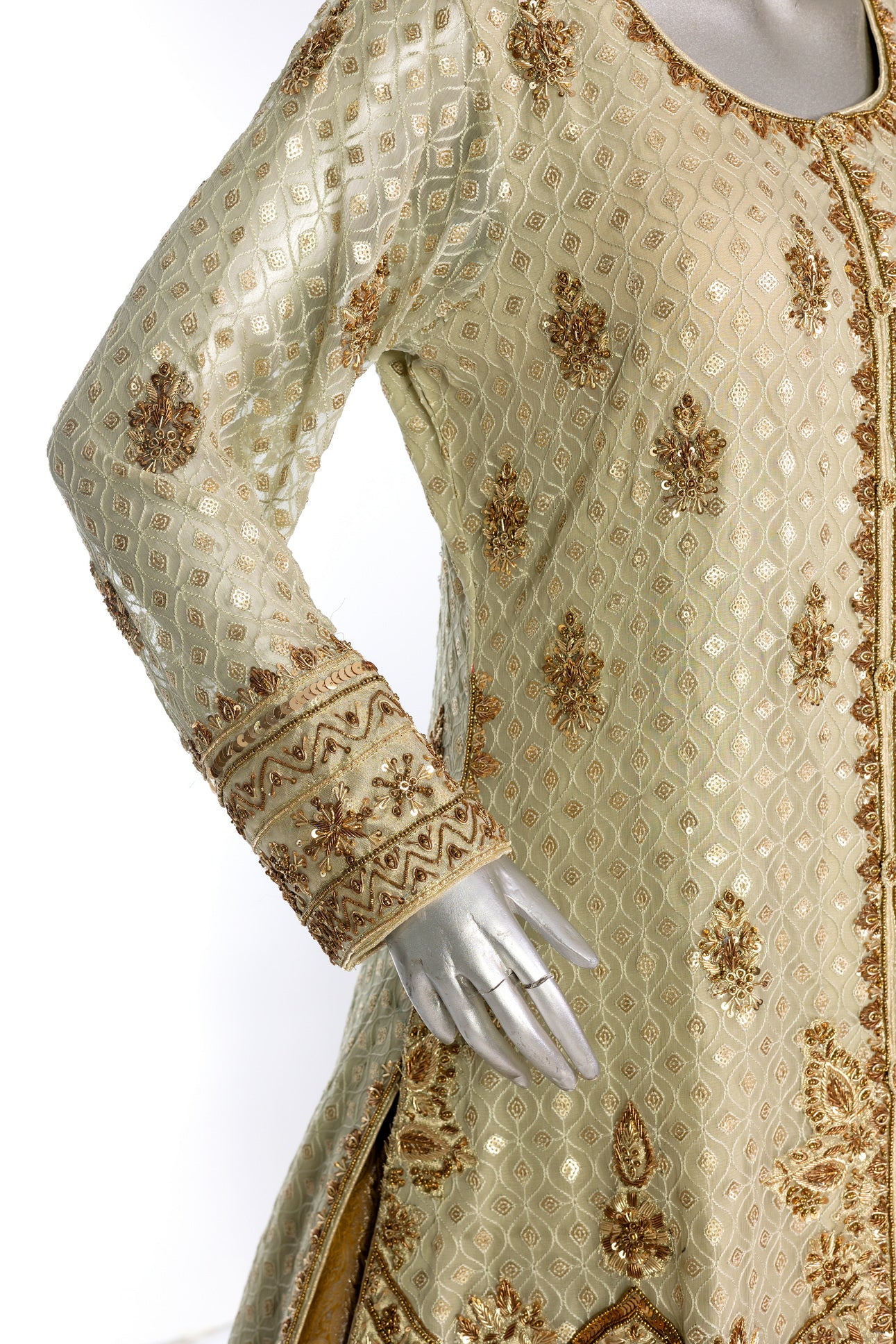 Olive green and gold Pakistani bridal Anarkali dress by MariamRaj, featuring gold and copper handwork, gold lehenga, and net dupatta – custom stitched for UK weddings.