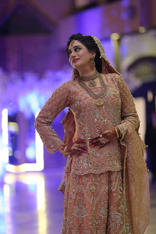 Peach pink organza kurti and farshi lehenga with embroidered dupatta – Pakistani bridal outfit for USA, Canada, and Europe.