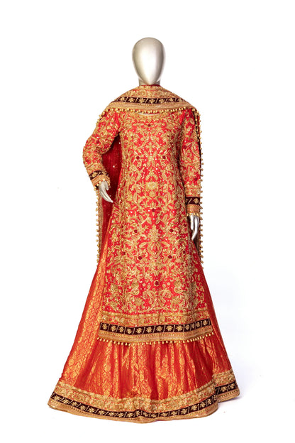 Red bridal lehenga outfit by MariamRaj featuring embroidered kameez, gold-detailed lehenga, and net dupatta with golden ball edging – ideal for Pakistani barat weddings.