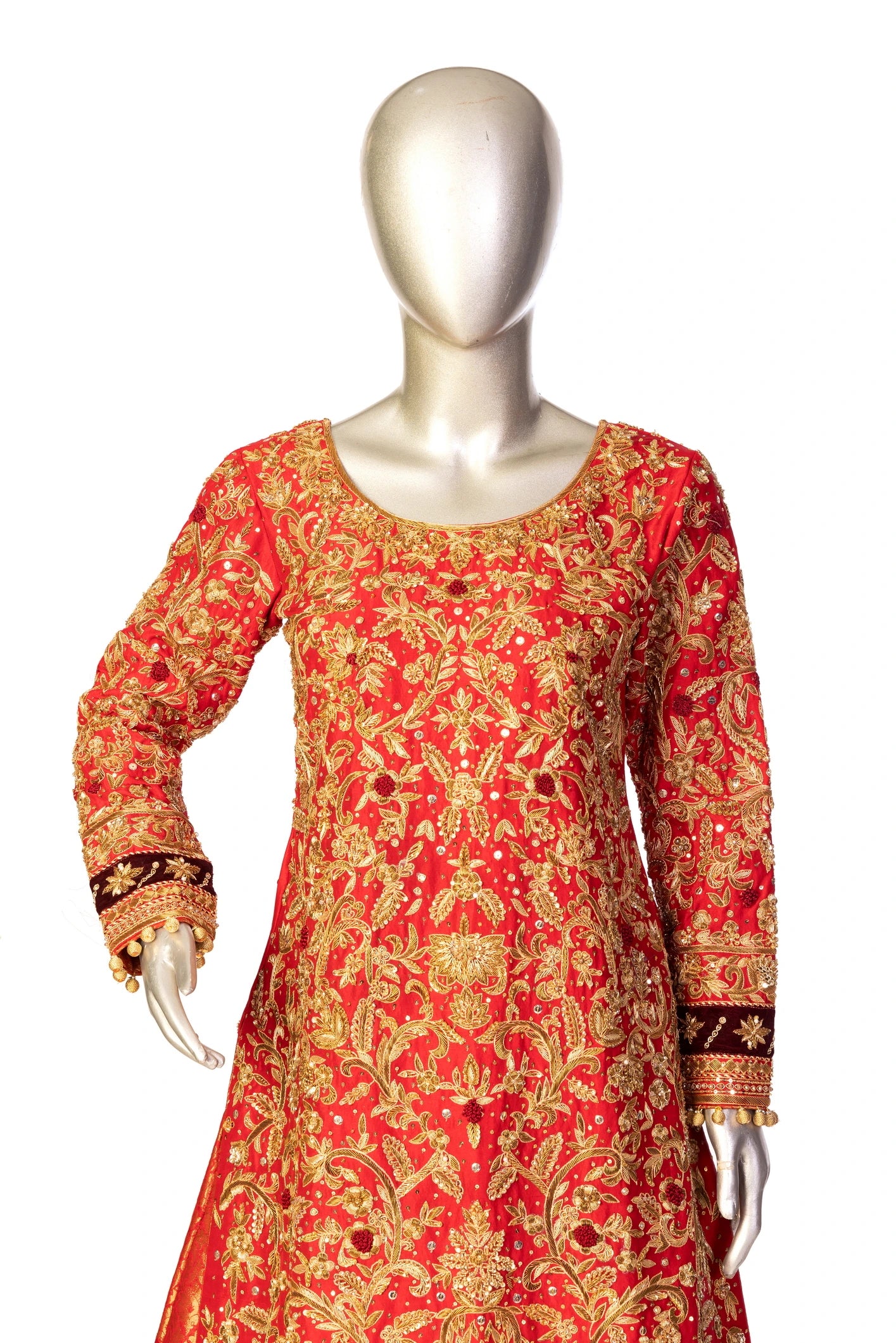 Red bridal lehenga outfit by MariamRaj featuring embroidered kameez, gold-detailed lehenga, and net dupatta with golden ball edging – ideal for Pakistani barat weddings.