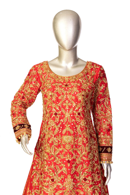 Red bridal lehenga outfit by MariamRaj featuring embroidered kameez, gold-detailed lehenga, and net dupatta with golden ball edging – ideal for Pakistani barat weddings.