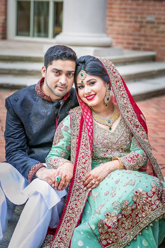 Skyline Charm bridal outfit by MariamRaj featuring mint green embroidered chiffon shirt, embellished lehenga, and deep red dupatta with tassels – custom stitched for Pakistani weddings.

