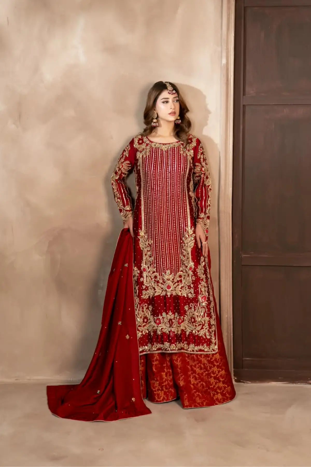 Surkhroo deep red hand embellished Sheesha silk formal suit with Jamawar palazzo and organza dupatta by MariamRaj