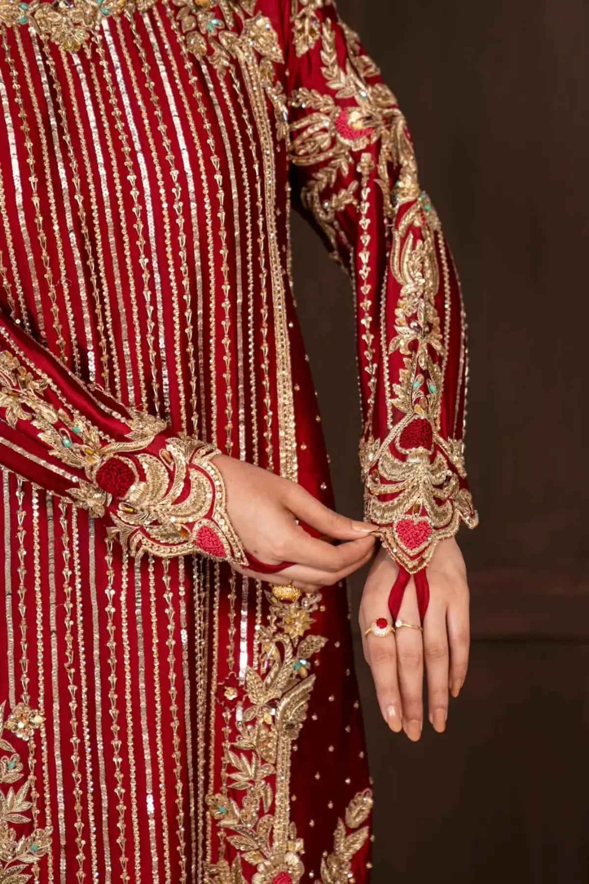 Surkhroo deep red hand embellished Sheesha silk formal suit with Jamawar palazzo and organza dupatta by MariamRaj