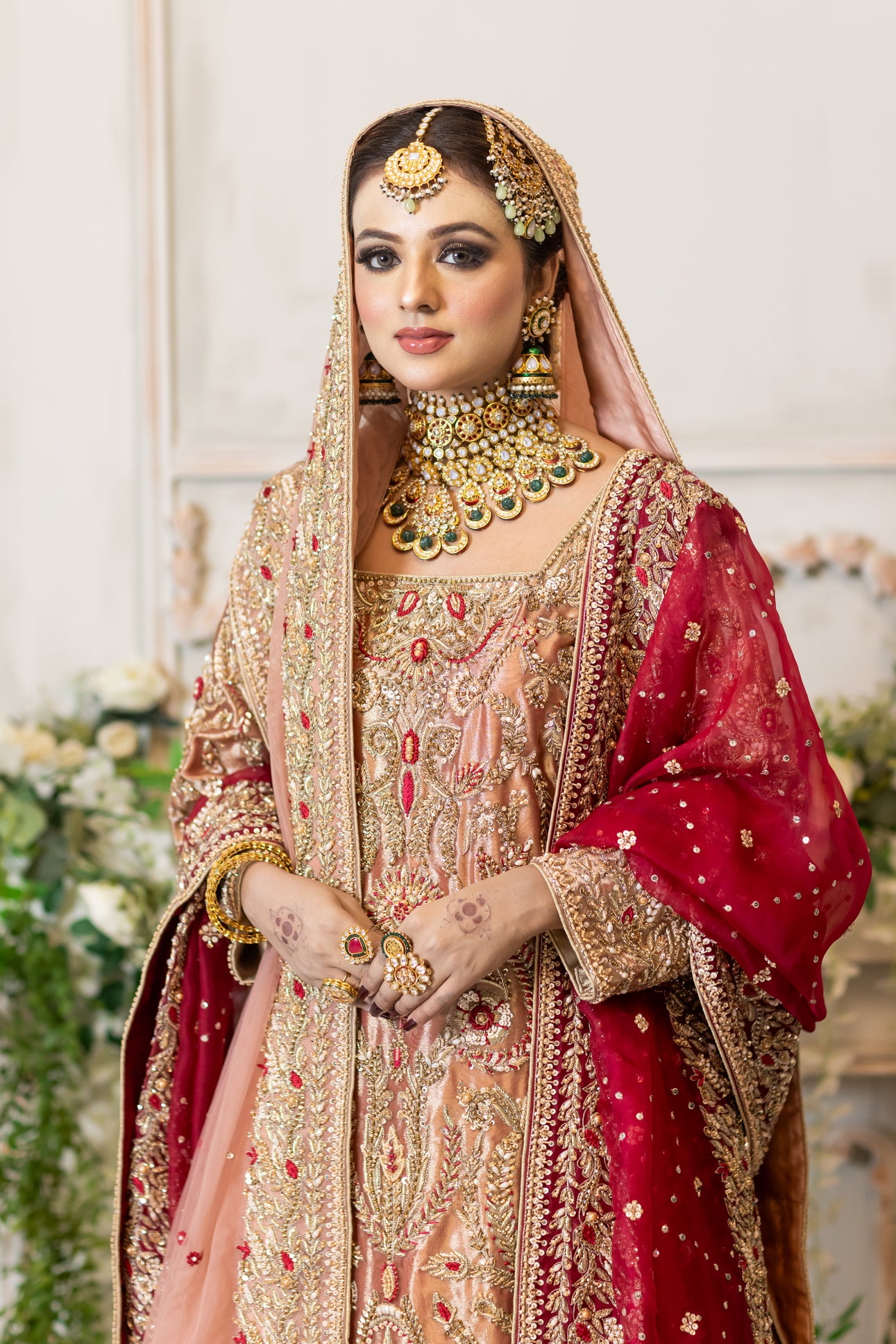 Tabinda peach tissue bridal lehenga with dual dupattas – Baraat Day bridal outfit by MariamRaj.com.