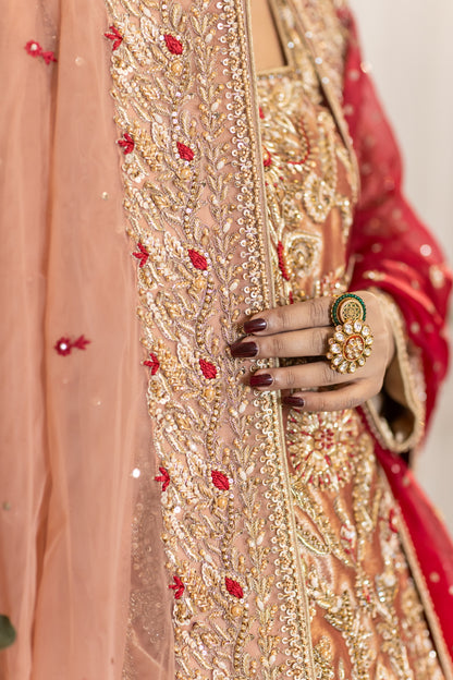 Tabinda peach tissue bridal lehenga with dual dupattas – Baraat Day bridal outfit by MariamRaj.com.