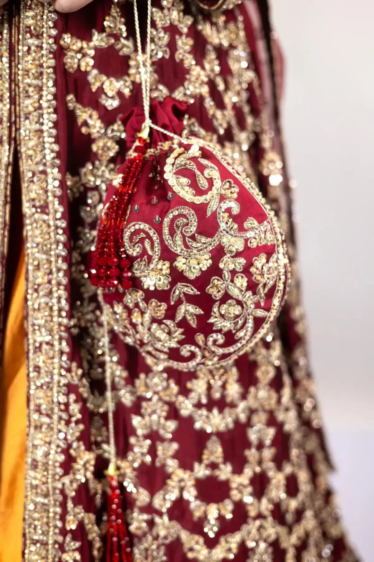Yumna – Maroon Raw Silk Shirt & Rust Lehnga for Elegant Bridal Occasions