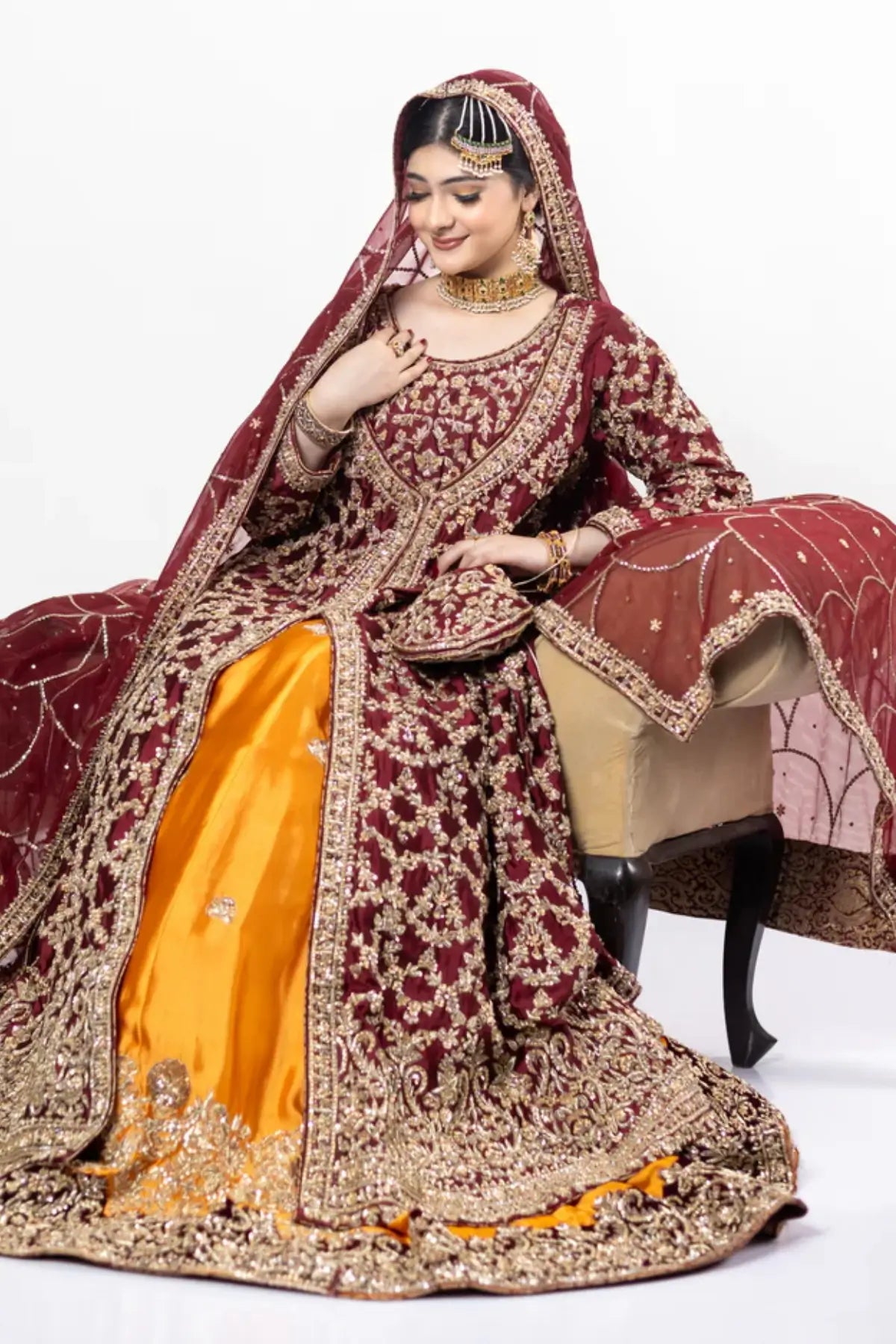 Yumna – Maroon Raw Silk Shirt & Rust Lehnga for Elegant Bridal Occasions