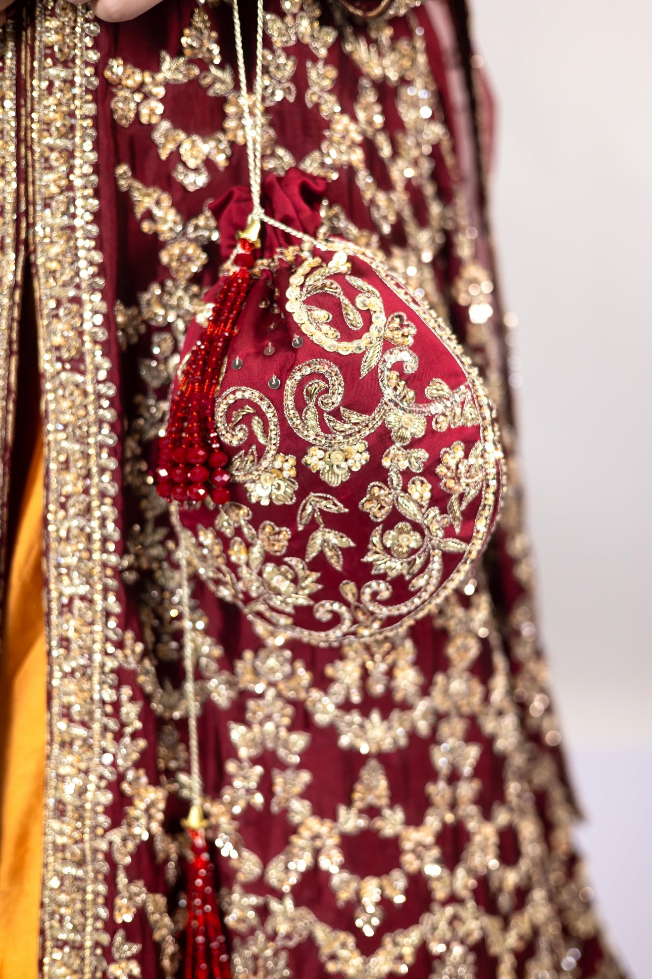 Yumna Maroon Raw Silk Shirt & Rust Lehnga with Net Organza Dupatta by MariamRaj