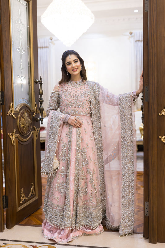 Pakistani formal pink gown with net shirt, organza lehenga, and dupatta – bridal-inspired reception outfit for wedding guests in Canada.
