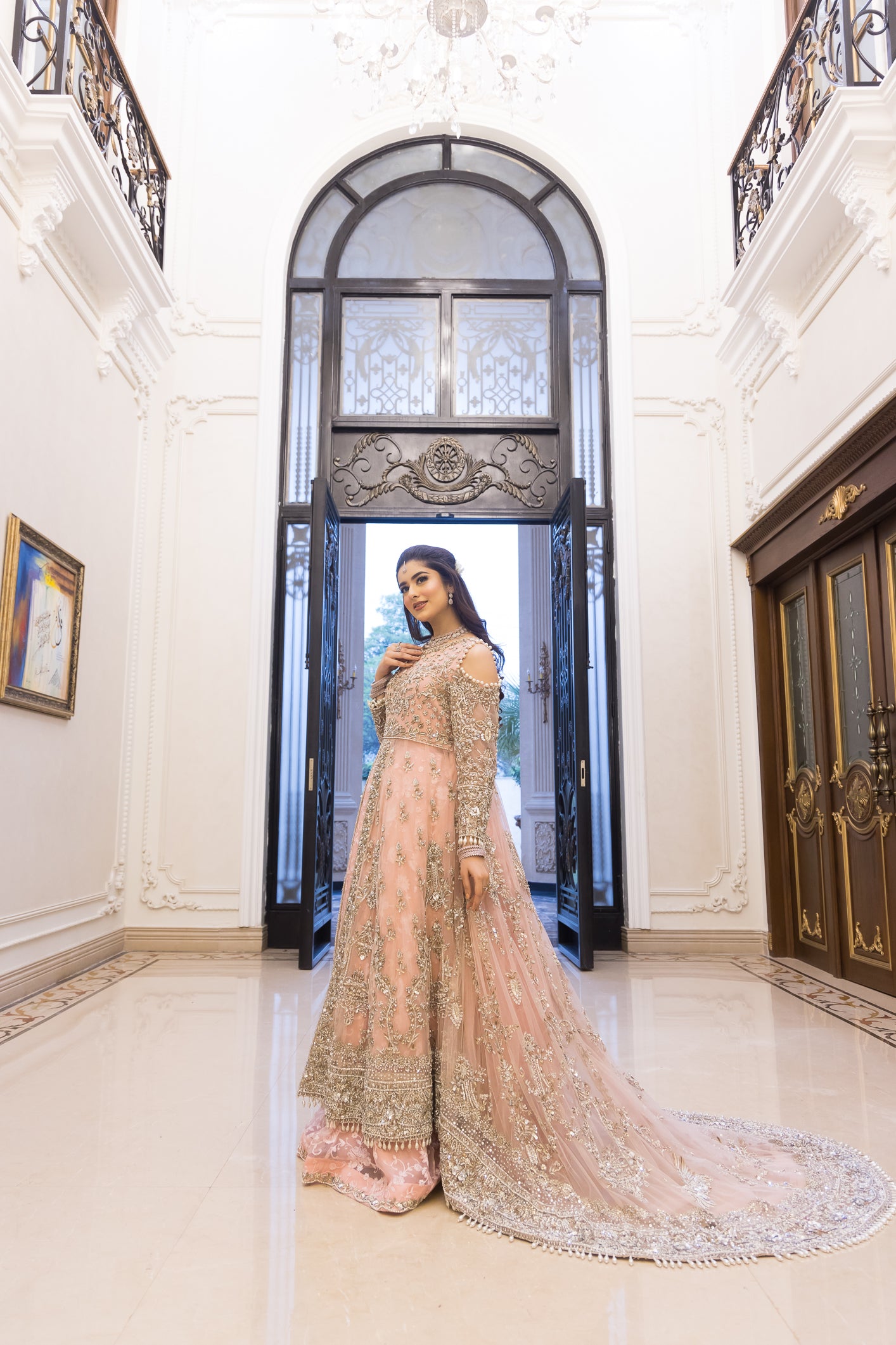 Pakistani formal pink gown with net shirt, organza lehenga, and dupatta – bridal-inspired reception outfit for wedding guests in Canada.