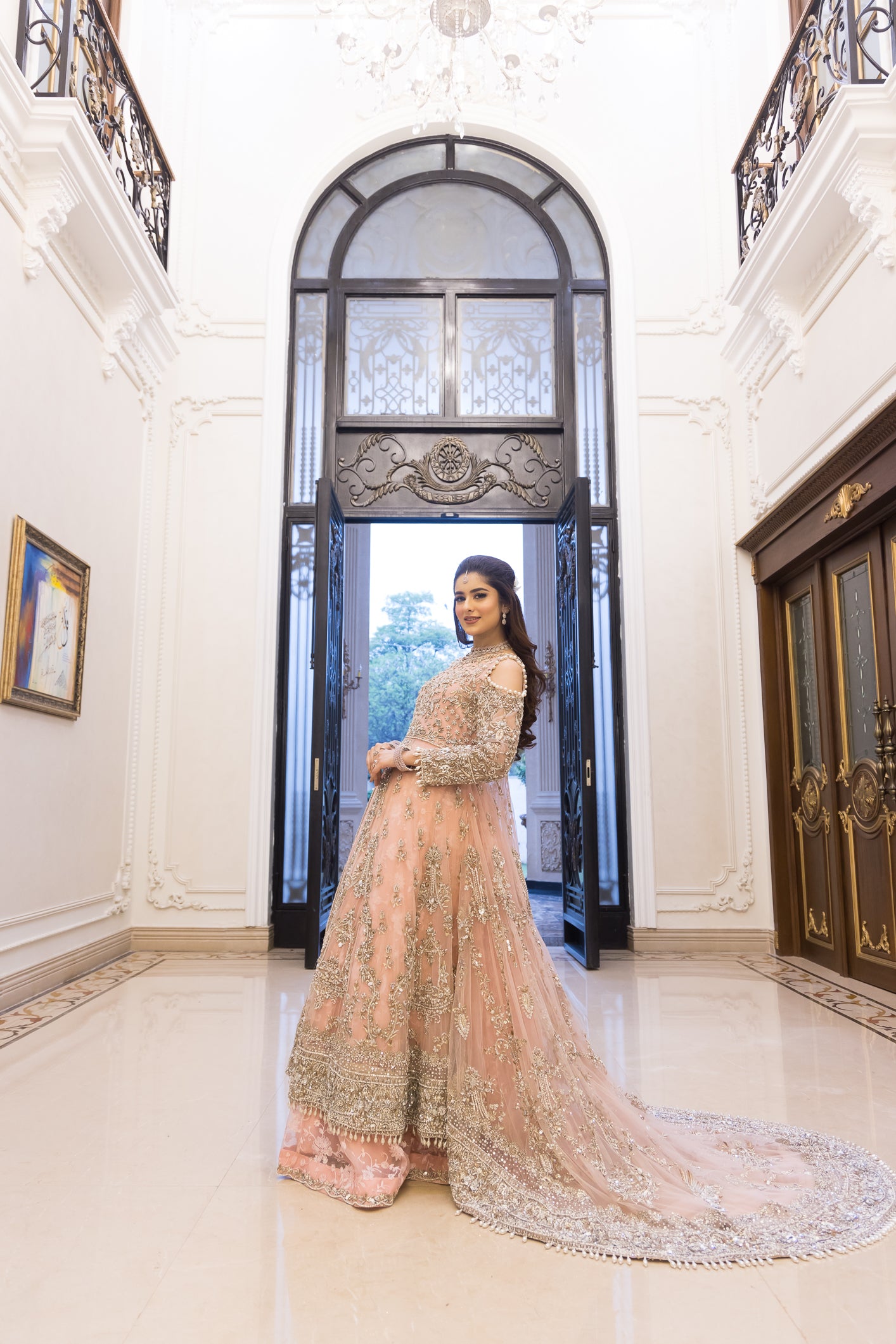 Pakistani formal pink gown with net shirt, organza lehenga, and dupatta – bridal-inspired reception outfit for wedding guests in Canada.