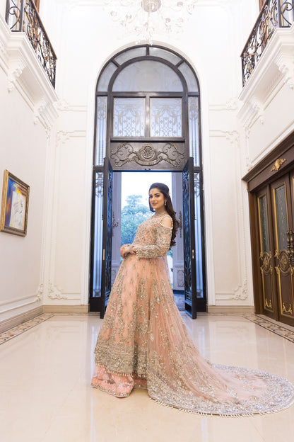 Pakistani formal pink gown with net shirt, organza lehenga, and dupatta – bridal-inspired reception outfit for wedding guests in Canada.