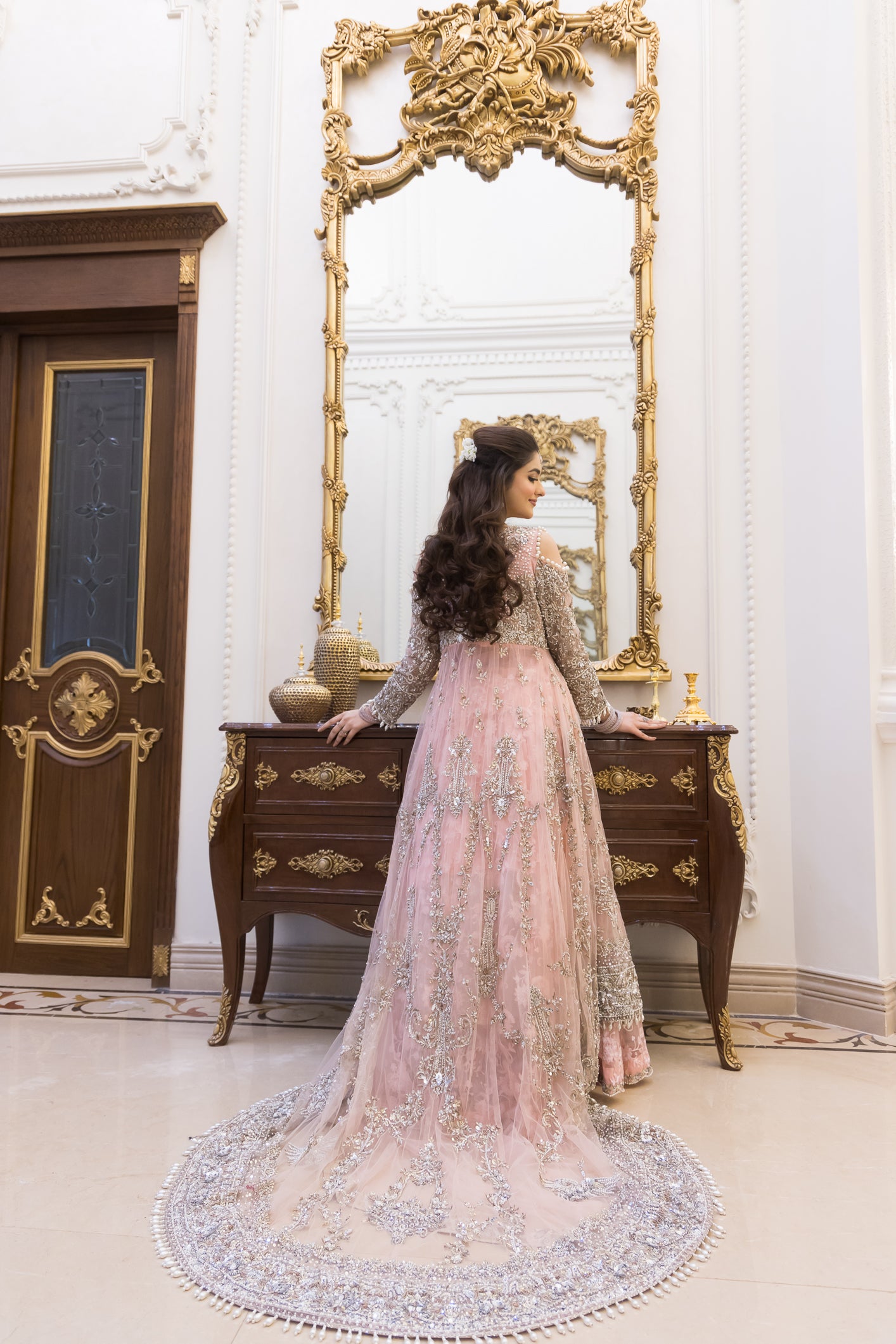 Pakistani formal pink gown with net shirt, organza lehenga, and dupatta – bridal-inspired reception outfit for wedding guests in Canada.