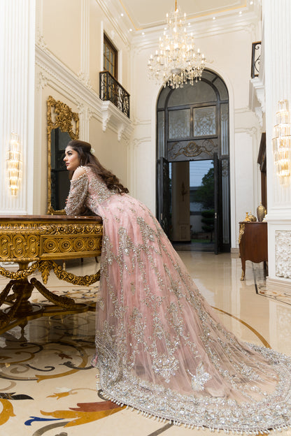 Pakistani formal pink gown with net shirt, organza lehenga, and dupatta – bridal-inspired reception outfit for wedding guests in Canada.